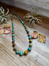 24-Inch Graduated Turquoise Necklace with Sterling Silver Saucers – One-of-a-Kind