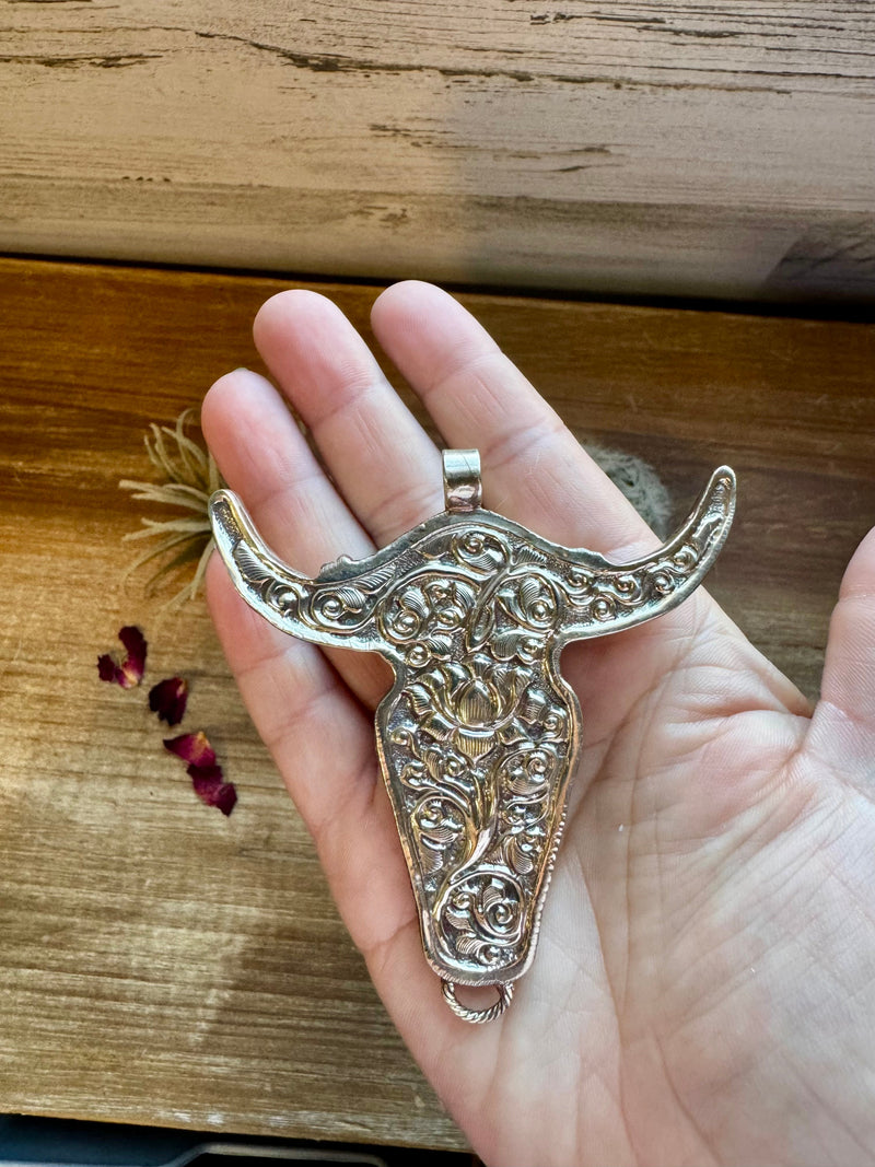 Big Antler longhorn with  turquoise pendant