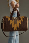 Brown, Camel, and Tan Duffel Bag
